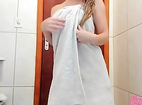 Exit the bath with just a towel, dancing folded with laying on council cream