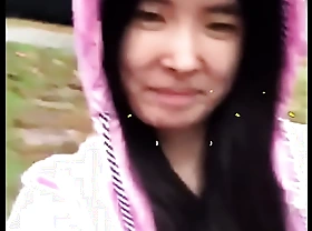 Asian Legal age teenager straightforward discloses mortal physically in the rain!